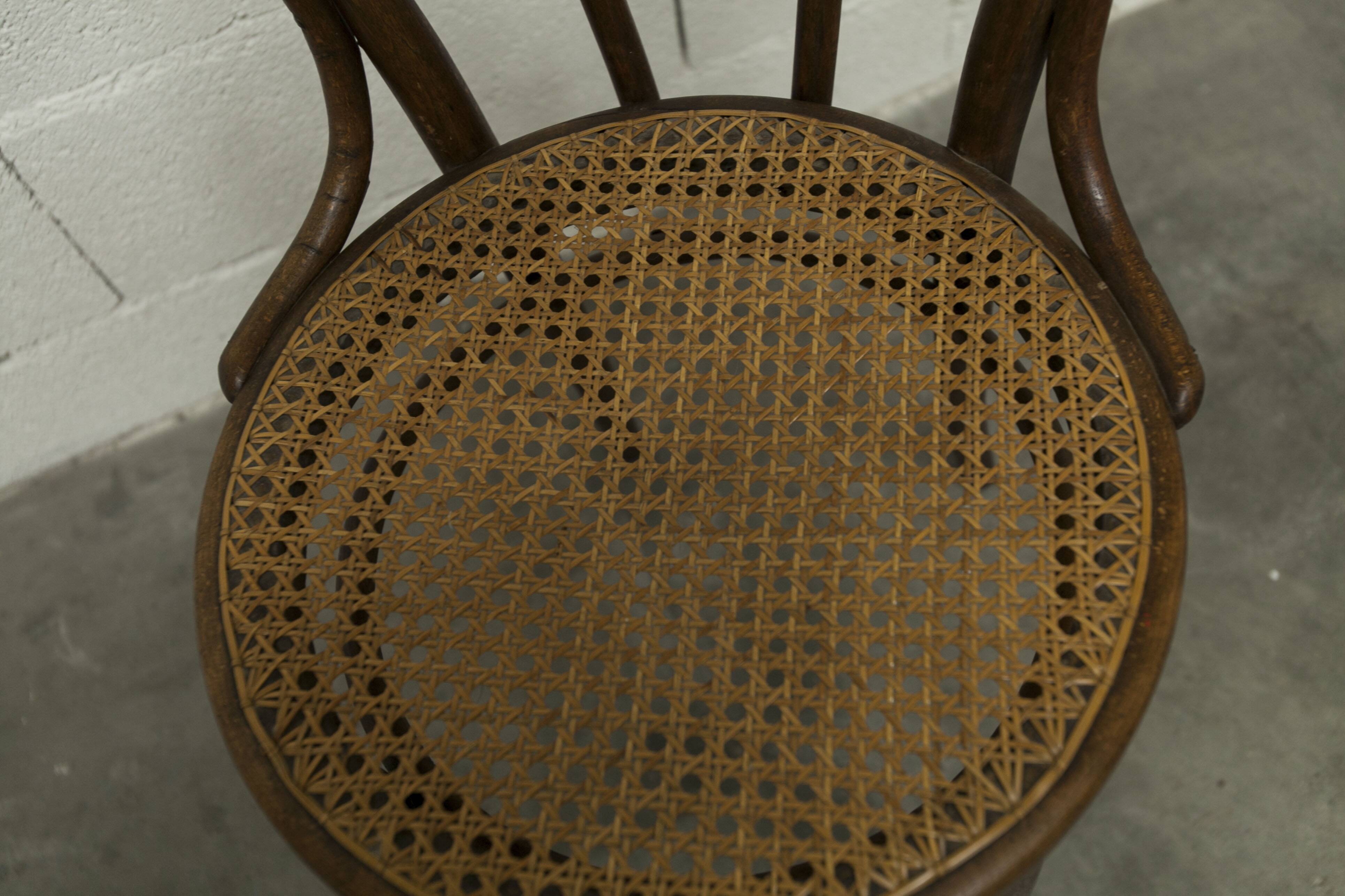 1920s curved wooden cane bistro chair