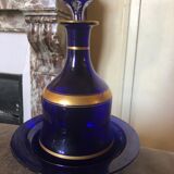 Night carafe and its blue glass saucer