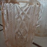 Carafe and bottle of pink glass and worked