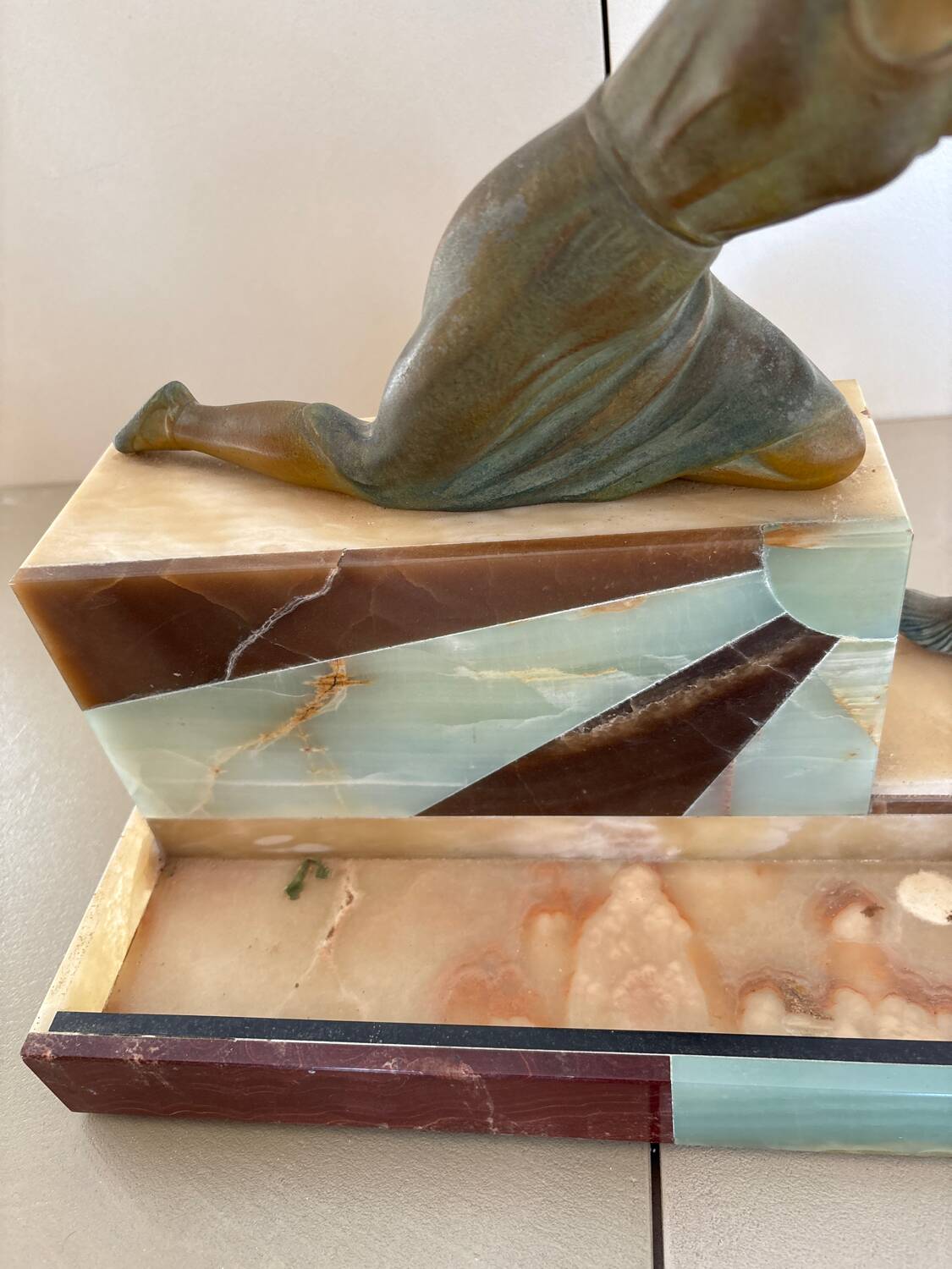 Sculpture of a woman with a greyhound