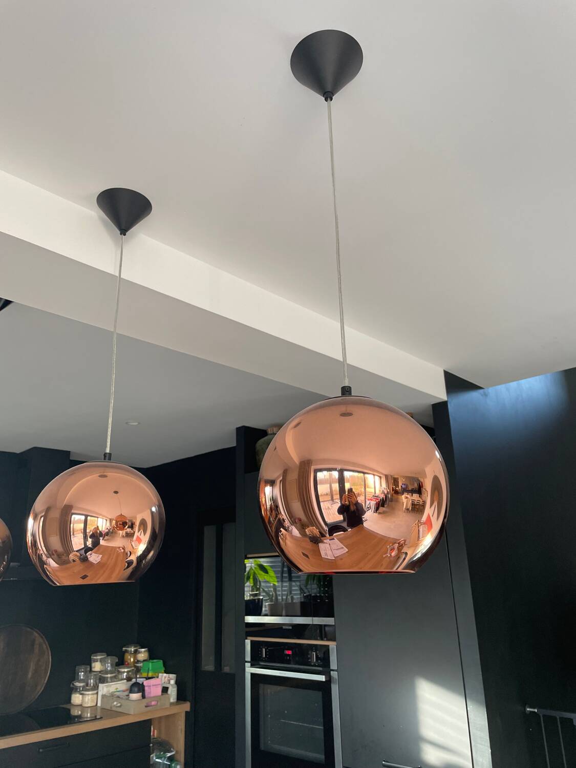 Copper Tom Dixon pendant lights individually