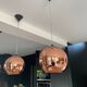 Copper Tom Dixon pendant lights individually