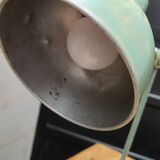Old green industrial desk lamp