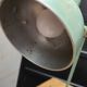 Old green industrial desk lamp