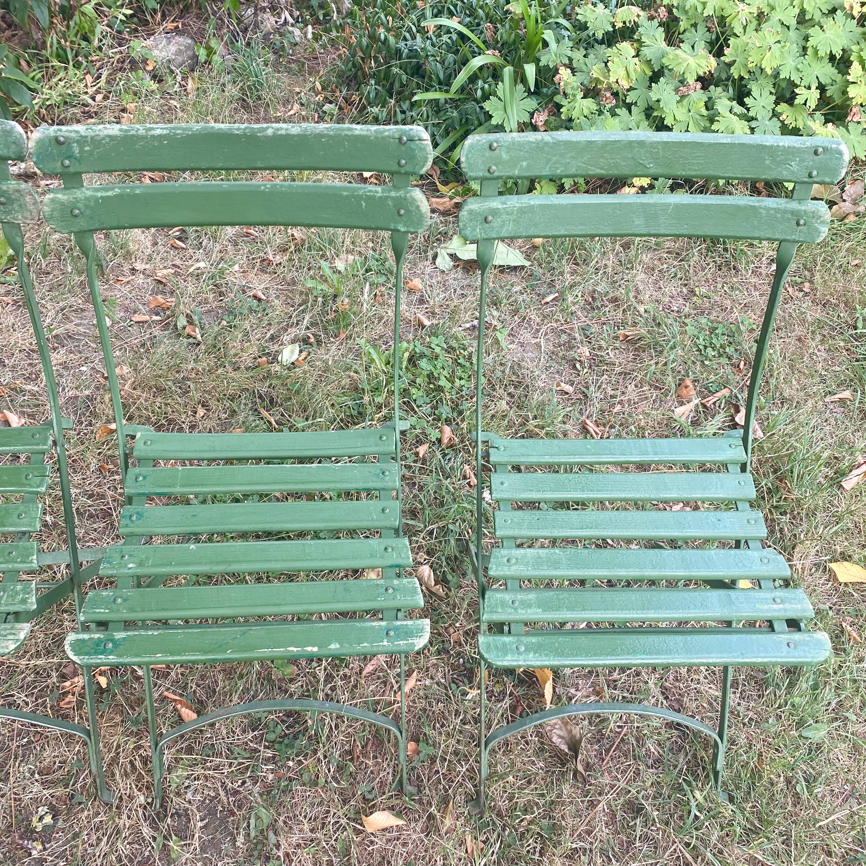 Antique folding garden chairs with wooden slats