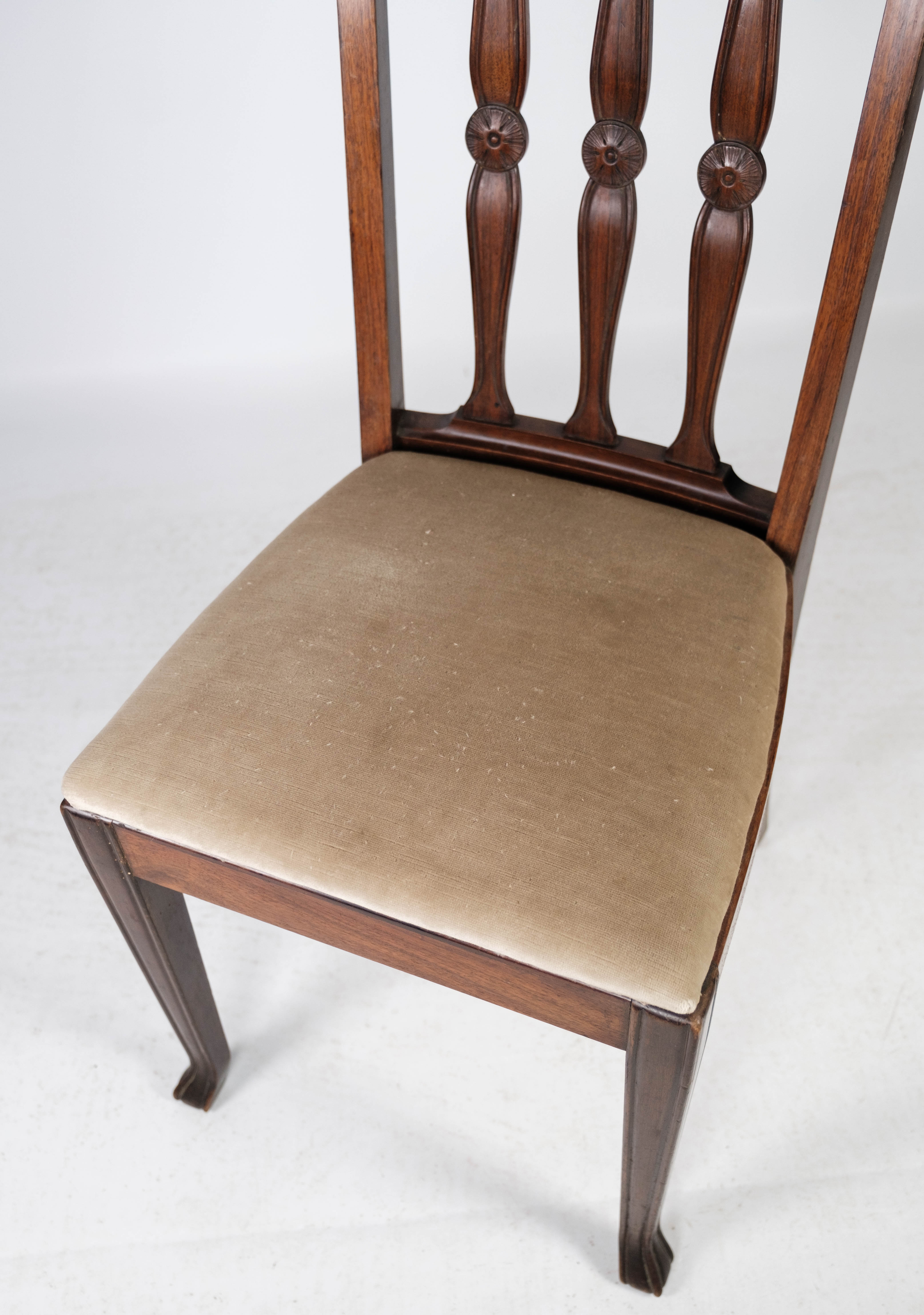 Set of four dining room chairs in rosewood and upholstered with light fabric, 1920s