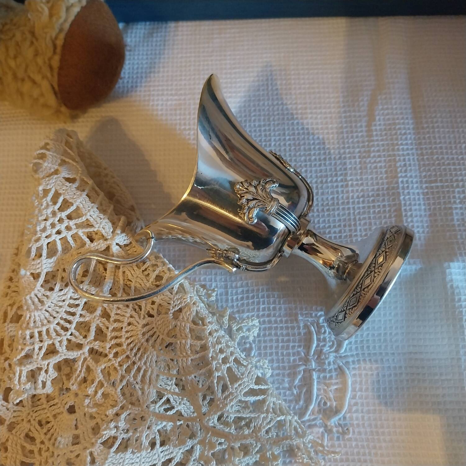 Old silver-plated milk jug