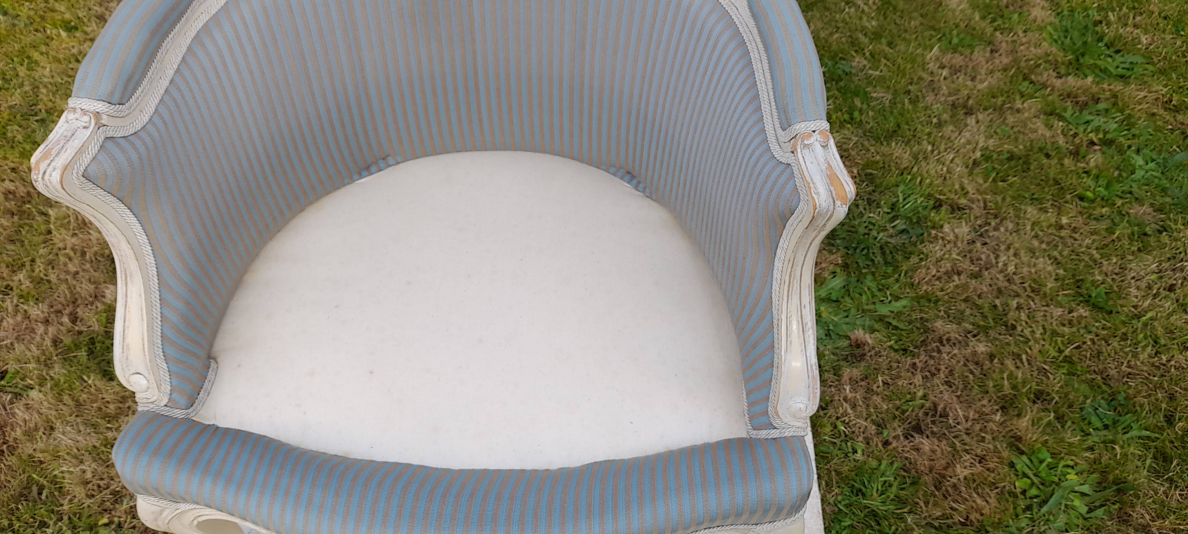 Bergère armchair with blue striped seat and back