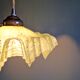Art Deco pendant light in speckled green and white pleated glass, 1920s-30s.