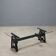 Antique adjustable coffee table in iron and glass, Italy, 20th century.