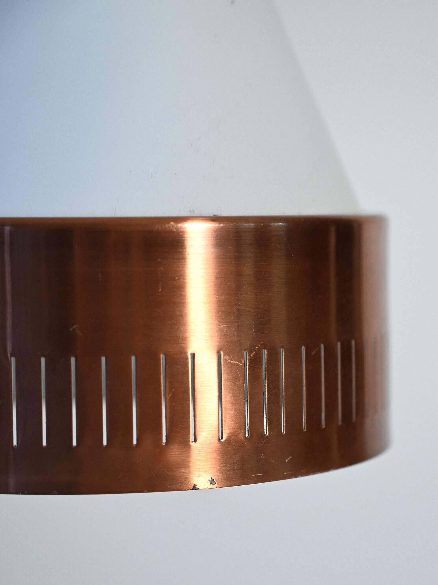 Scandinavian conic pendant lamp with copper detail