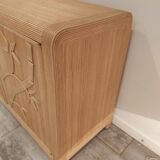 Vintage wicker sideboard with flowers