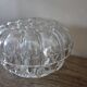 Large round glass flower frog vase with 19 holes.