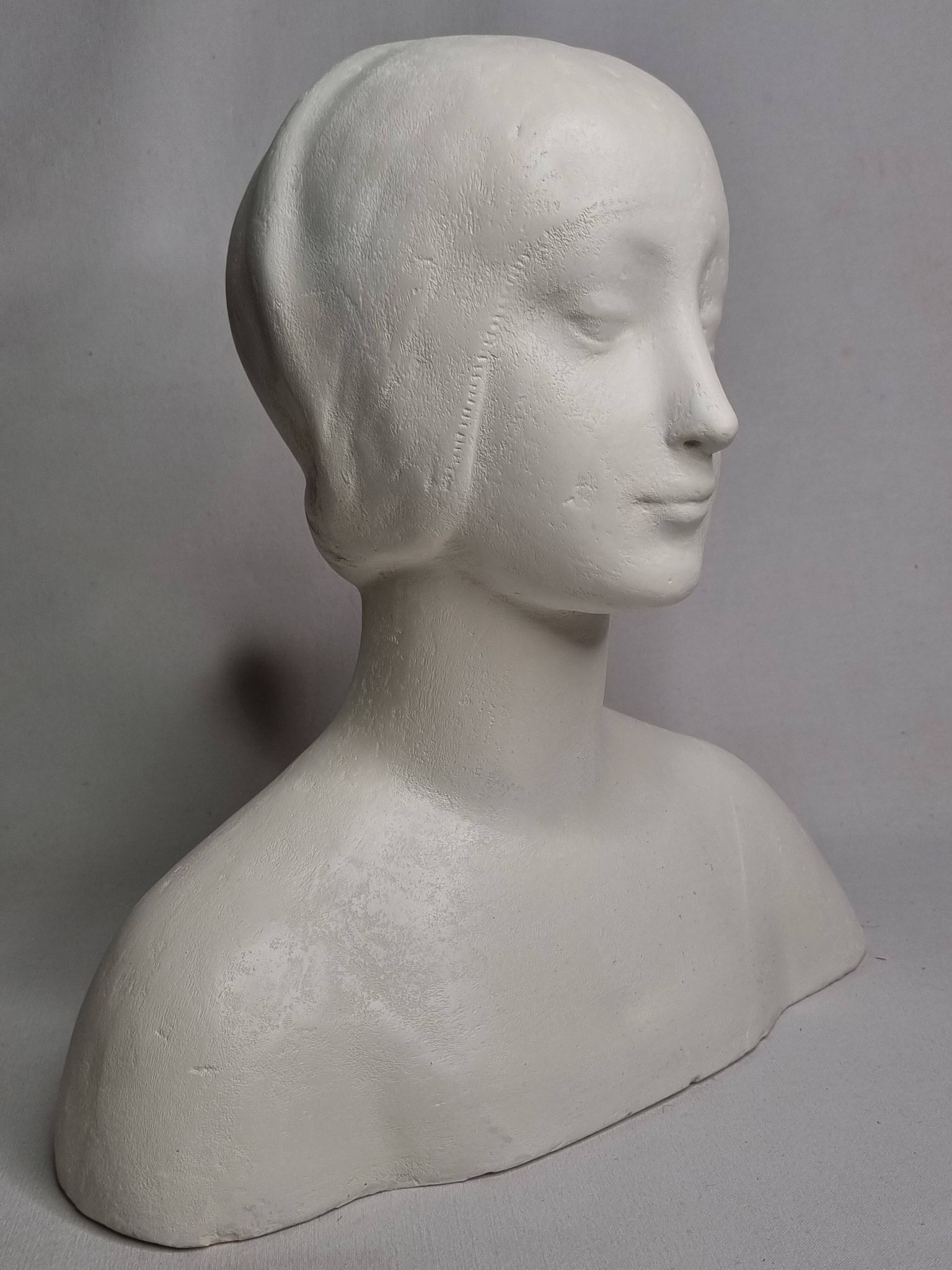 Bust after Laurana in Renaissance style, known as Aragon, patinated plaster, 33 cm.