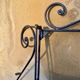 Wrought iron folding shelf