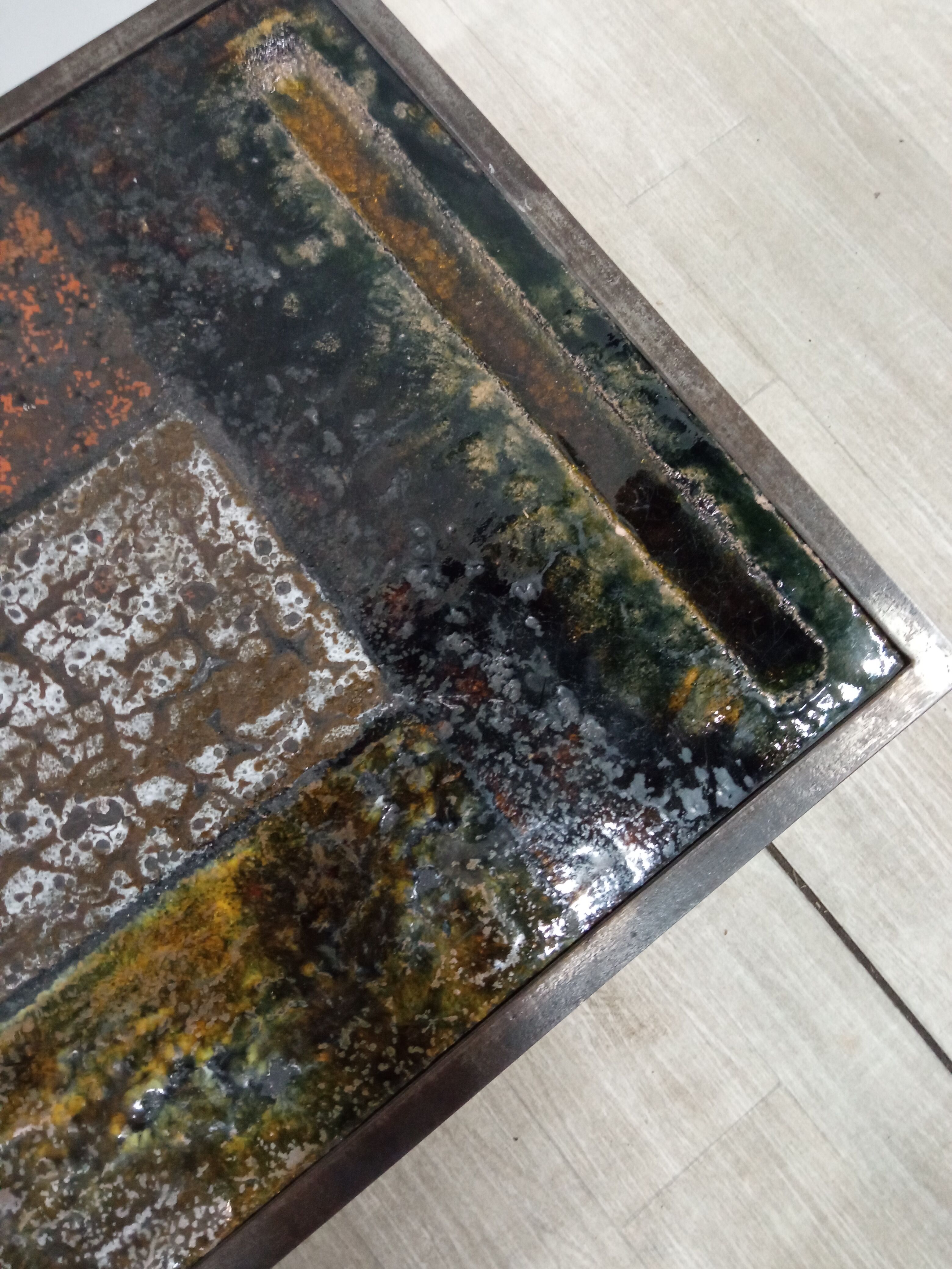 Coffee table in enamelled lava stone