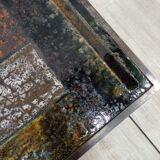 Coffee table in enamelled lava stone