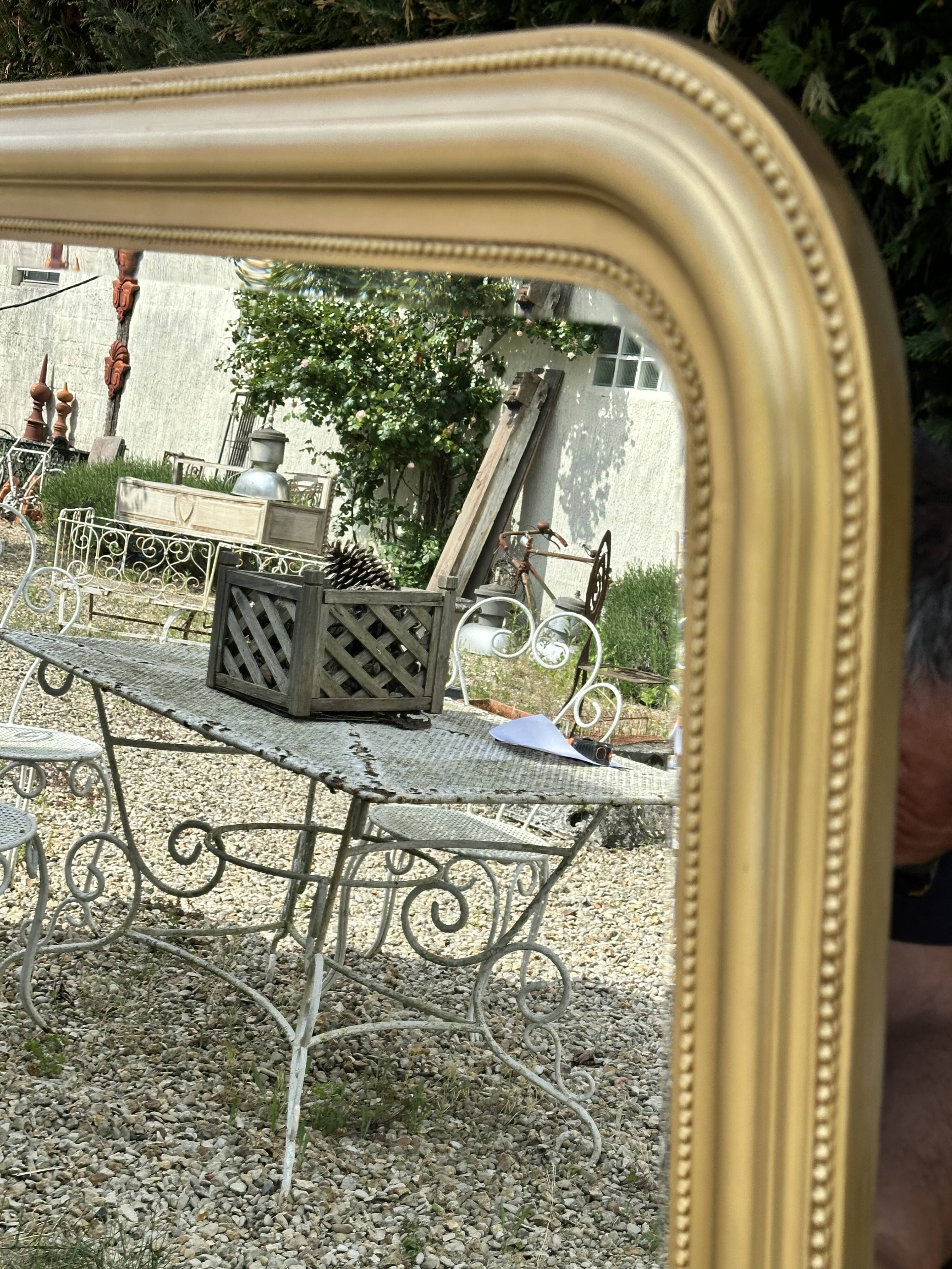 Louis Philippe style mirror in gilded wood 135x105cm