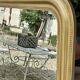 Miroir de style Louis Philippe en bois doré