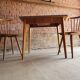 Together two Scandinavian chairs and its wooden and formica table