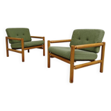 Pair of chalet style armchairs in green fabric
