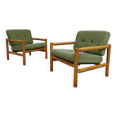 Pair of chalet style armchairs in green fabric