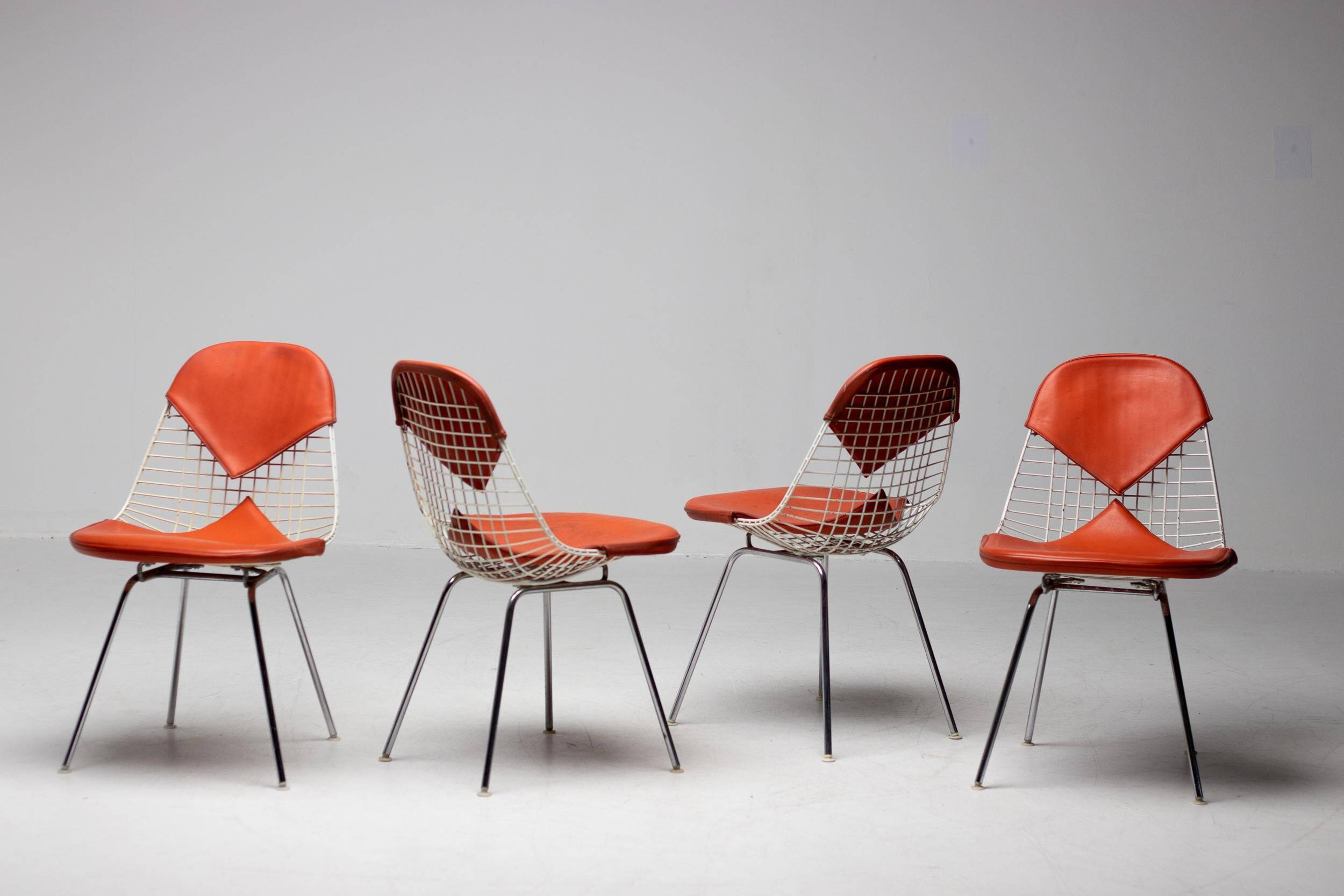 Set of 4 Eames wire chairs for Herman Miller with original Bikini seats by Girard.