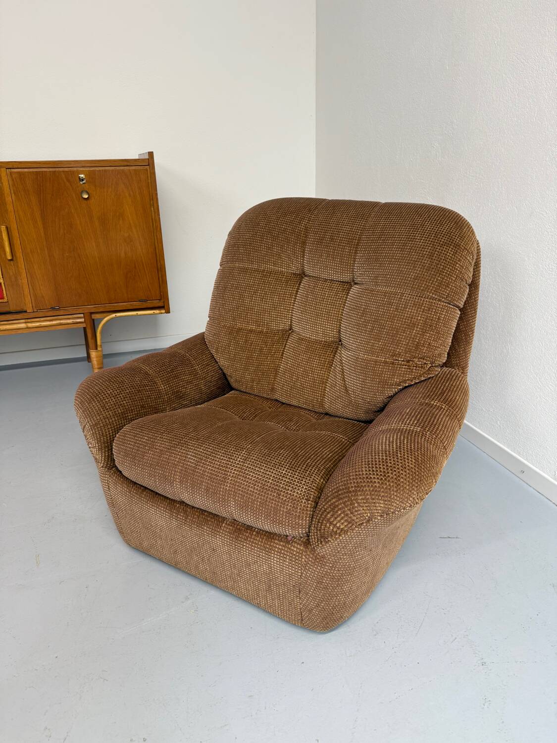 Old vintage 60s fabric lounge chair