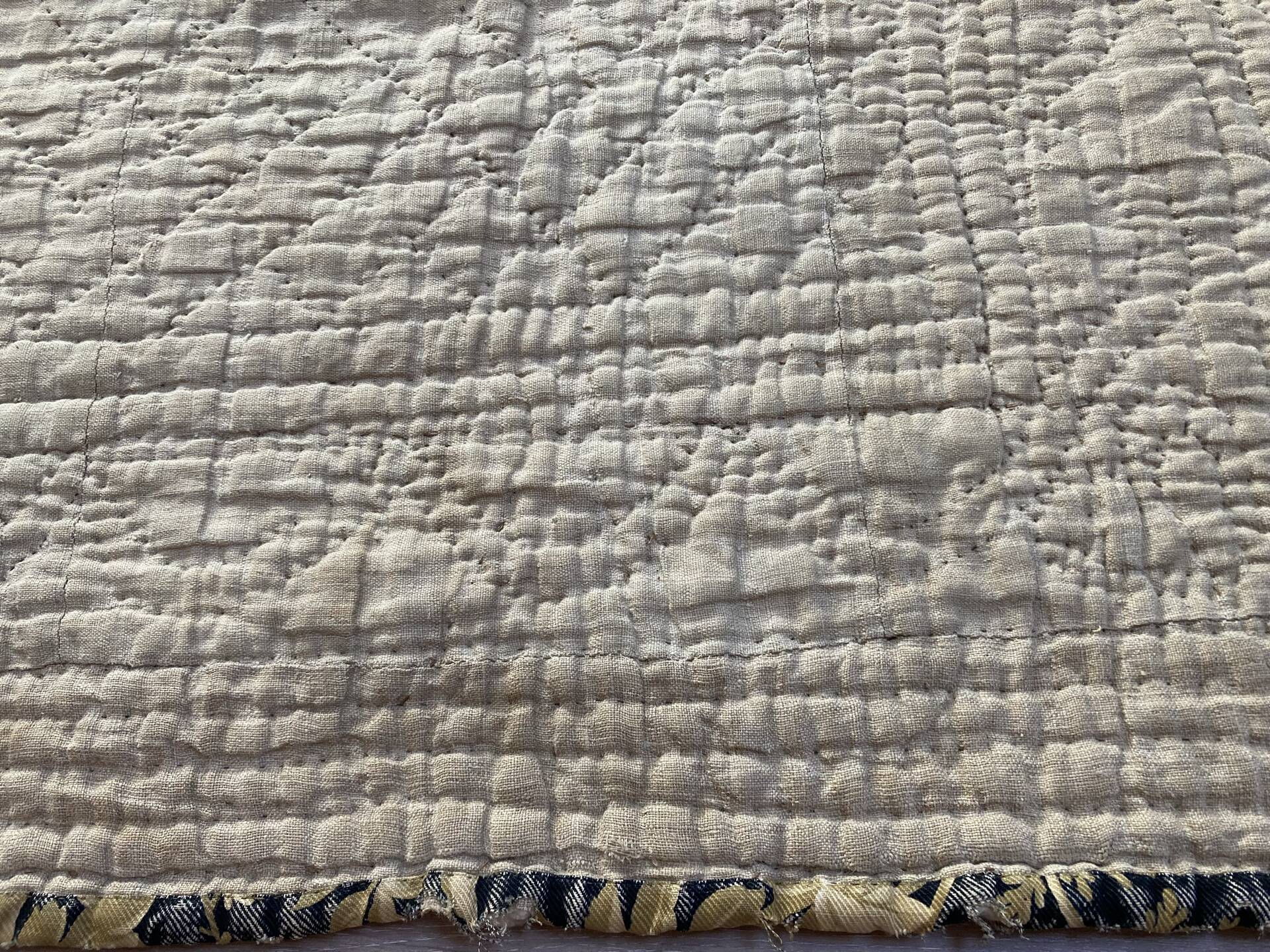 Antique hand-stitched boutis bedspread, floral fabric, 19th century.
