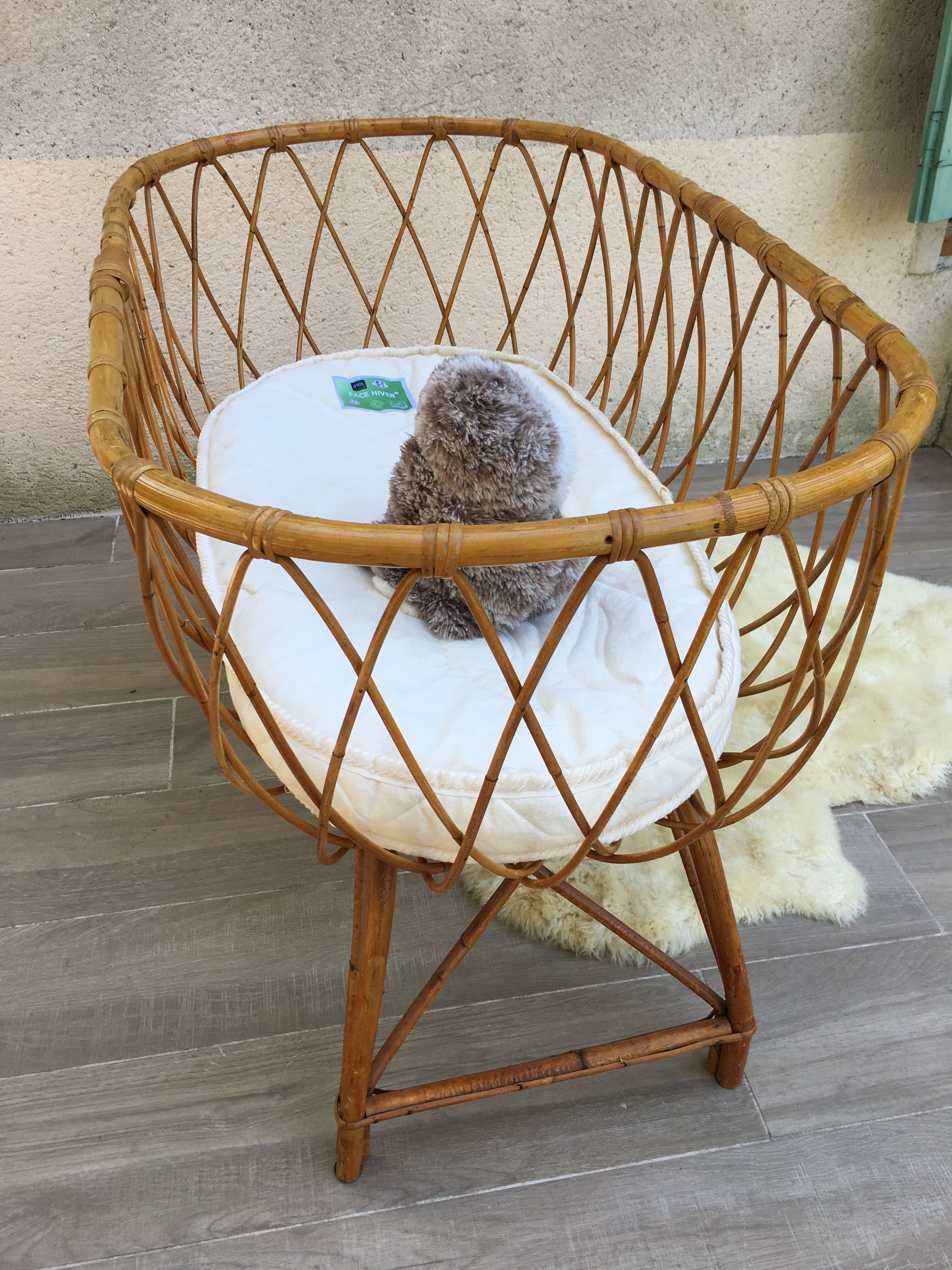 Vintage rattan cradle