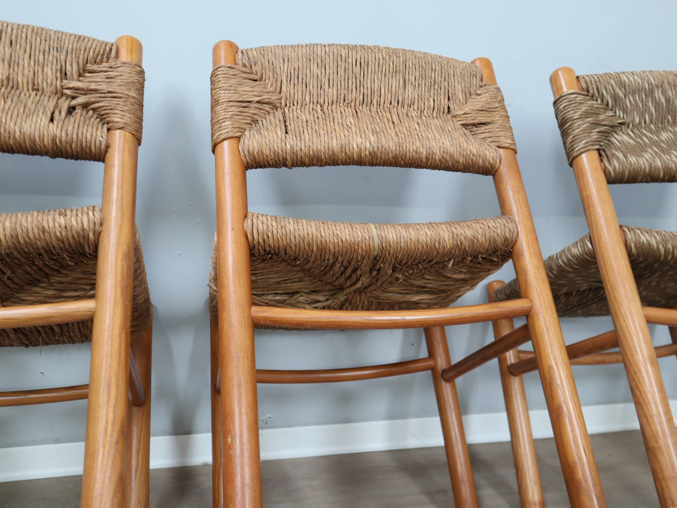 Set of 8 chairs 1960s Charlotte Perriand Style woven straw & wood