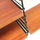 Vintage wall shelf designed by A.D. Dekker for Tomado in the 1960s