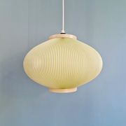 Vintage oval-shaped suspension in pleated celluloid, light green colour, 1960.