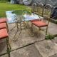 Italian brass dining table and chairs, 1970s, set of 7