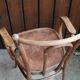 Curved wooden armchair