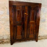 Old wooden doors of a Savoyard wardrobe chalet mountain vintage