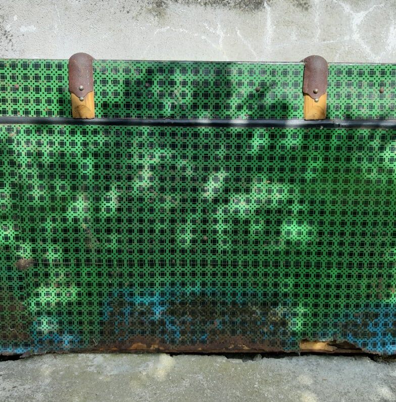 Vintage green metal trunk