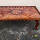 Antique carved wooden coffee table