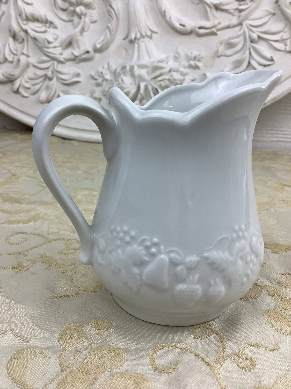 Small white porcelain milk jug