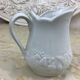 Small white porcelain milk jug