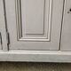 Gray patinated kitchen cabinet