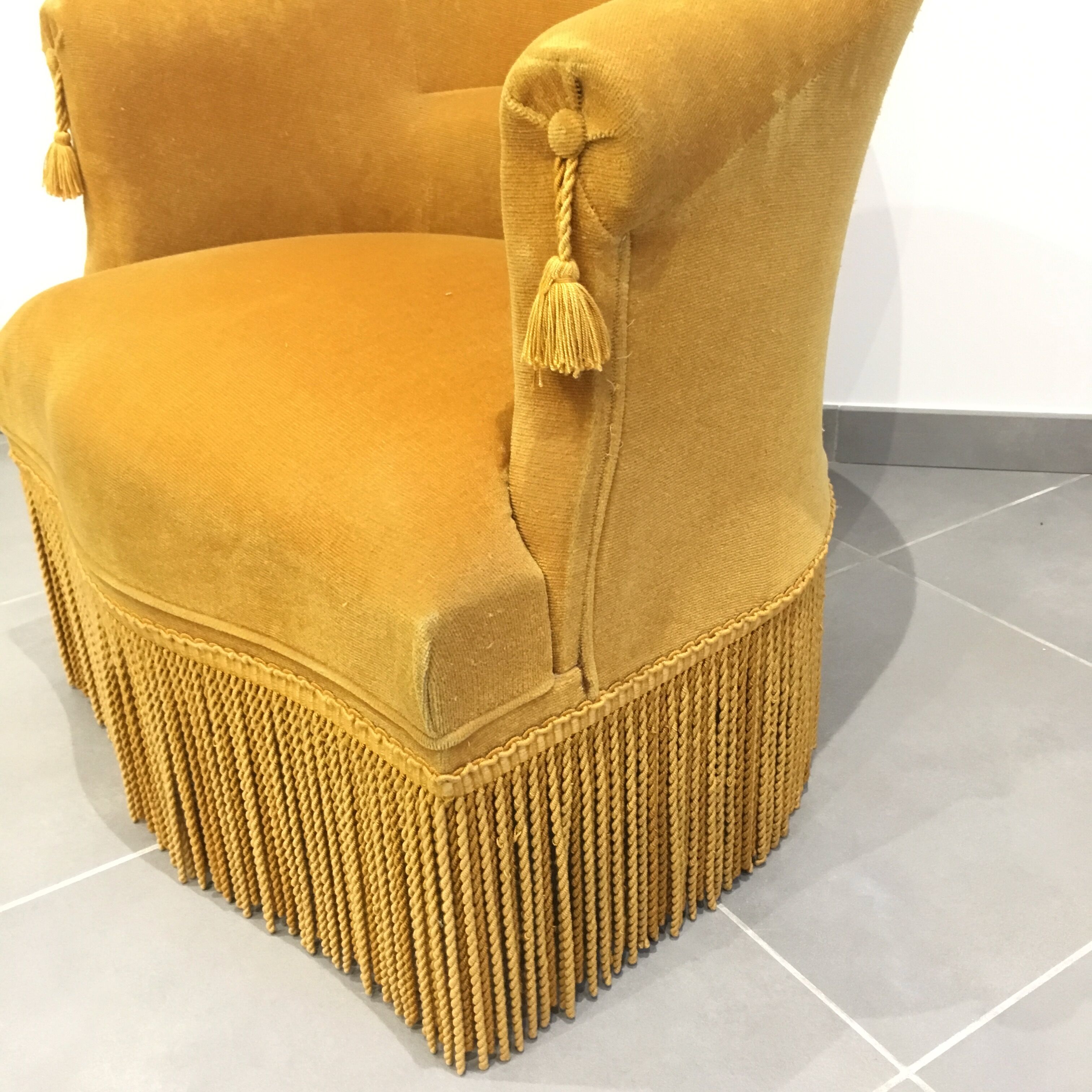 Pair of velvet fringed low chairs