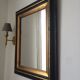 Miroir ancien noir et doré  81x66cm