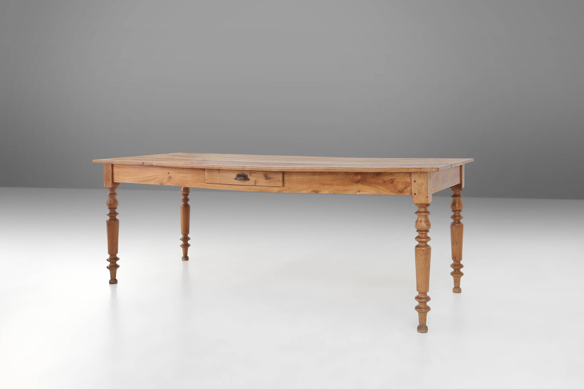 Wabi sabi style French dinner table in elm wood with drawer, ca. 1850