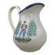 1 St Clément earthenware pouring jug decorated with characters