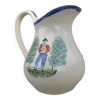 1 St Clément earthenware pouring jug decorated with characters
