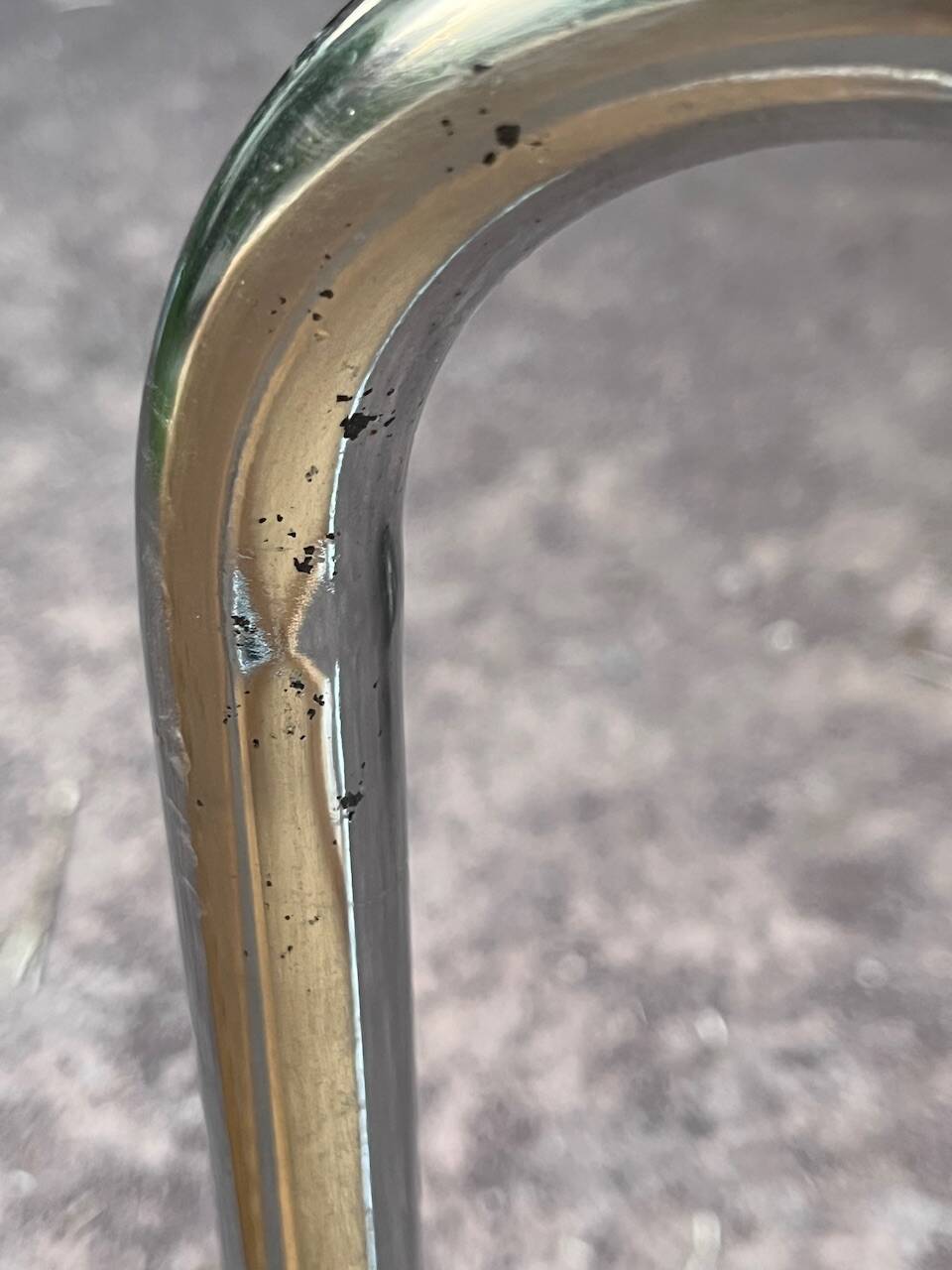 Wooden chair with caning in the style of Marcel Breuer.