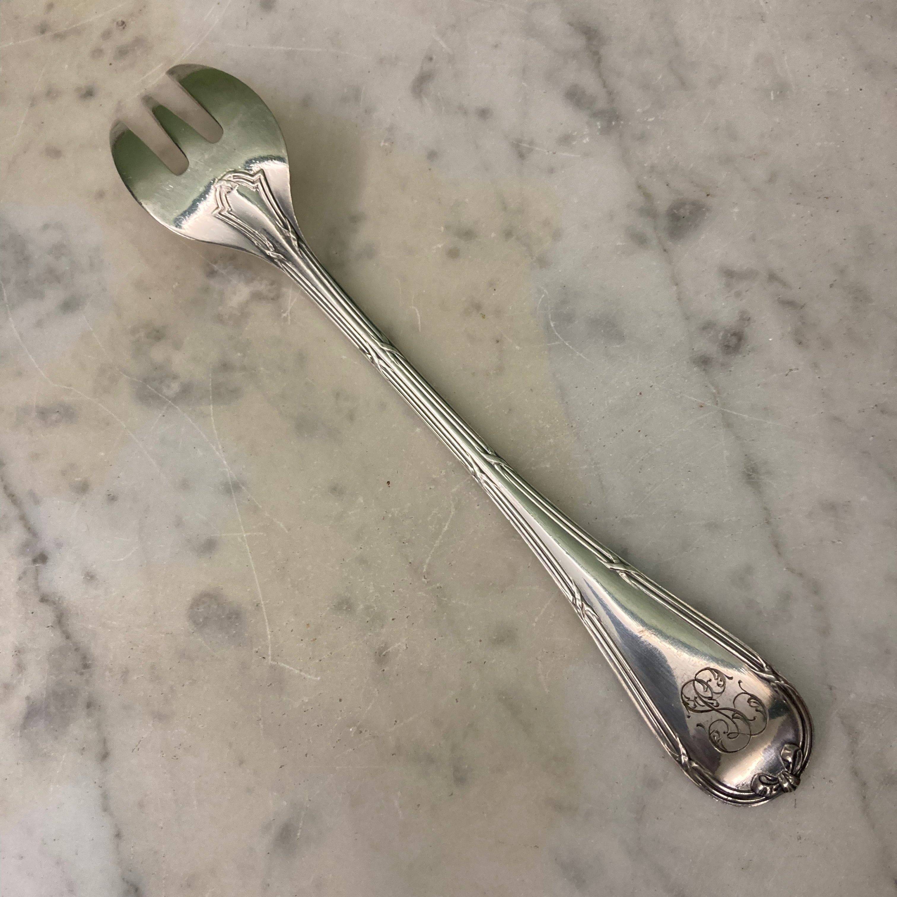 Christofle house 12 crossed ribbon oyster forks