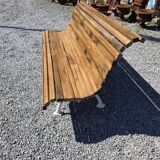 Antique garden bench made of cast iron and oak slats