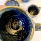 Part of a signed enameled stoneware coffee service